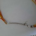 Kundbild Gummiklubba, 35 mm - gummi/plast: Lagat ett halsband..
